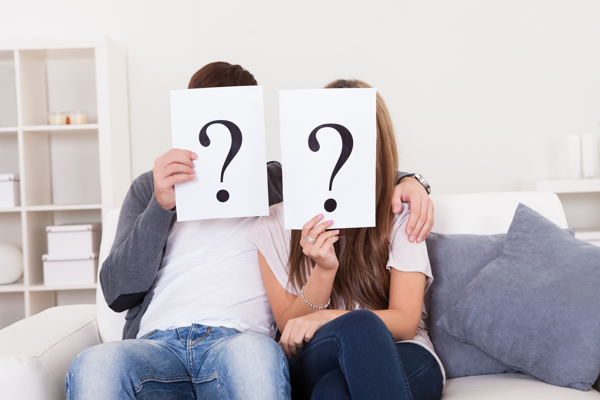 Couple with question marks